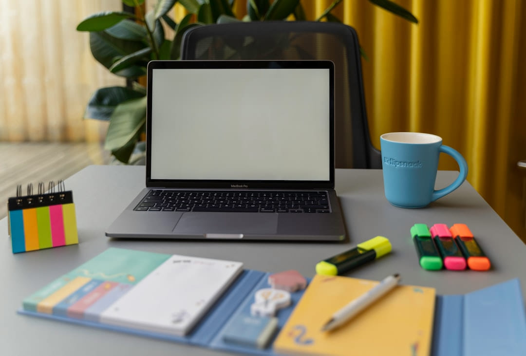 a laptop on a table on The Digital Hustler